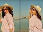 Kajal Aggarwal, who is expecting her first child, is currently vacationing in Dubai. The actor has been sharing some beautiful pictures of herself flaunting her baby bump. In her recent set of photos, Kajal can be seen posing in a pink bodycon dress and striped oversized shirt.(Instagram/@kajalaggarwalofficial)