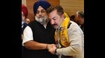 Congress MP from Khadoor Sahib Jasbir Singh Dimpa’s younger brother Rajan Gill joining the SAD in presence of party chief Sukhbir Singh Badal in Amritsar on Wednesday.Sameer Sehgal/HT