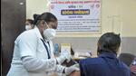 A health worker inoculates a beneficiary against Covid-19 in Sangli on Wednesday. Uday Deolekar/HT photo A health worker inoculates a beneficiary against Covid-19 in Sangli on Wednesday. Uday Deolekar/HT photo
