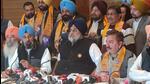 Khadoor Sahib Congress MP Jasbir Singh Dimpa’s younger brother Rajan Gill (extreme right) after joining the Shiromani Akali Dal in Amritsar on Wednesday in the presence of party chief Sukhbir Singh Badal (centre) and Amritsar East SAD candidate Bikram Singh Majithia. (Sameer Sehgal/HT)
