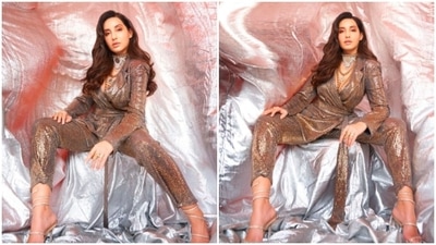 Nora Fatehi manages to make heads turn every time she steps out in stunning outfits. Earlier, the Canadian beauty made jaws drop as she posed in a shimmery co-ord set. (Instagram/@manekaharisinghani) Nora Fatehi manages to make heads turn every time she steps out in stunning outfits. Earlier, the Canadian beauty made jaws drop as she posed in a shimmery co-ord set. (Instagram/@manekaharisinghani)