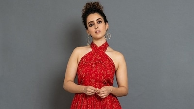 In another photo, Sanya Malhotra looked like a princess straight out of a Disney movie in a red halter gown. (Instagram/sanyamalhotra_) In another photo, Sanya Malhotra looked like a princess straight out of a Disney movie in a red halter gown. (Instagram/sanyamalhotra_)
