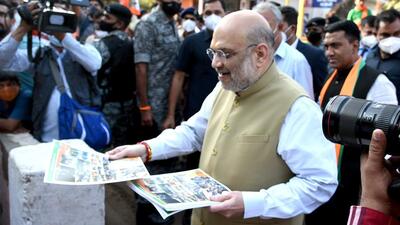 Union home minister Amit Shah spent the day campaigning door to door in the Bicholim constituency in North Goa and urged the people of the state to vote for the BJP. (ANI Photo) Union home minister Amit Shah spent the day campaigning door to door in the Bicholim constituency in North Goa and urged the people of the state to vote for the BJP. (ANI Photo)