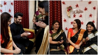 Rahul also looked dapper in an all-black ensemble for celebrating Makar Sankranti. He wore a black silk satin bandhgala kurta with pulled-back full sleeves and black pyjamas. The singer teamed the look with a beaded bracelet and a floral bead adorned mala around his neck. What do you think of the couple's look? (Instagram/@dishaparmar) Rahul also looked dapper in an all-black ensemble for celebrating Makar Sankranti. He wore a black silk satin bandhgala kurta with pulled-back full sleeves and black pyjamas. The singer teamed the look with a beaded bracelet and a floral bead adorned mala around his neck. What do you think of the couple's look? (Instagram/@dishaparmar)