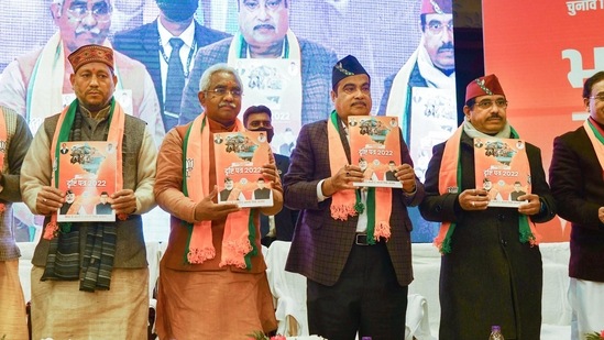 Union Minister Nitin Gadkari along with Union Minister &amp; BJP's Uttarakhand election in-charge Pralhad Joshi, former union minister Ramesh Pokhriyal, MP Tirath Singh Rawat, Uttarakhand BJP President Madan Kaushik, and former CM Trivendra Singh Rawat, releases BJP's manifesto for the Uttarakhand Assembly elections, in Dehradun(PTI)