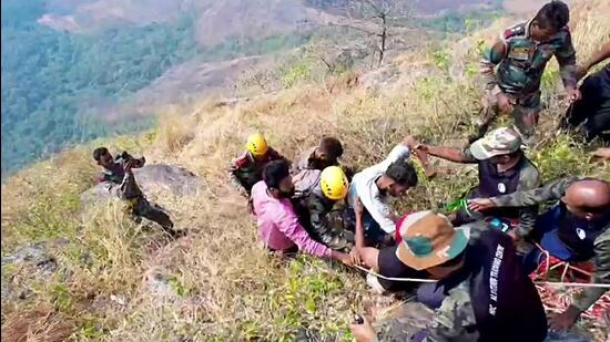 Kerala trekker R Babu who was trapped in the cleft of a remote mountain being rescued by the Army, in Palakkad on Wednesday. (ANI)