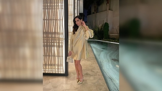 Nora Fatehi ditches bodycon dresses for this chic golden outfit ...