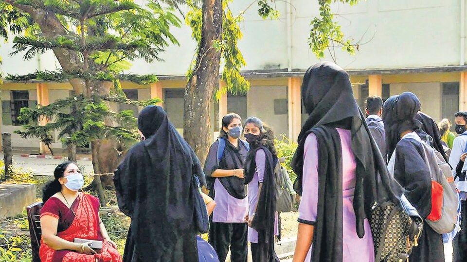 File photo of students in hijab. (PTI) File photo of students in hijab. (PTI)