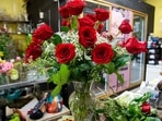 A floral arrangement with red roses is completed in preparation of the upcoming Valentine's Day holiday, at Company Flowers in Arlington, Virginia, February 8, 2022. (Photo by SAUL LOEB / AFP) A floral arrangement with red roses is completed in preparation of the upcoming Valentine's Day holiday, at Company Flowers in Arlington, Virginia, February 8, 2022. (Photo by SAUL LOEB / AFP)