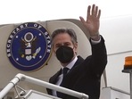 United States’ secretary of state Antony Blinken waves as he disembarks from his plane in Melbourne, Australia, on Wednesday, February 9, 2022. Blinken will meet with Australian foreign minister Marise Payne as well as their Indian and Japanese counterparts who form the so-called ‘Quad’. (AP)