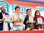 Congress general secretary Priyanka Gandhi Vadra with Uttar Pradesh party president Ajay Kumar Lallu (L) and other party leaders launches party manifesto 'Unnati Vidhan Jan Ghoshna Patra 2022' for the upcoming Uttar Pradesh Assembly election, at party state headquarters, in Lucknow on Wednesday, February 9, 2022. (ANI Photo) Congress general secretary Priyanka Gandhi Vadra with Uttar Pradesh party president Ajay Kumar Lallu (L) and other party leaders launches party manifesto 'Unnati Vidhan Jan Ghoshna Patra 2022' for the upcoming Uttar Pradesh Assembly election, at party state headquarters, in Lucknow on Wednesday, February 9, 2022. (ANI Photo)