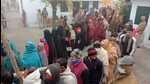 Voters waiting for their turn to cast vote in the first phase of Uttar Pradesh assembly elections, in Shamli on Thursday. (HT PHOTO)