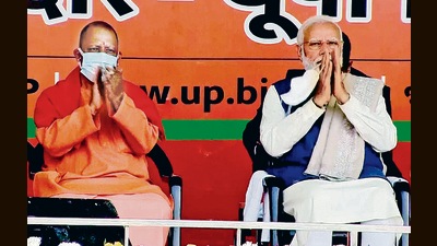 Prime Minister Narendra Modi with Uttar Pradesh Chief Minister Yogi Adityanath during a public meeting for the state Assembly elections, in Saharanpur on Thursday. (ANI) Prime Minister Narendra Modi with Uttar Pradesh Chief Minister Yogi Adityanath during a public meeting for the state Assembly elections, in Saharanpur on Thursday. (ANI)