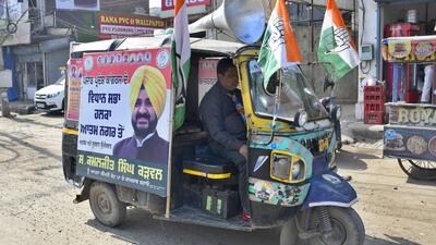 An auto rickshaw, fitted with loudspeakers, campaigning for Congress candidate Kamaljit Singh Karwal near Gill Chowk in Ludhiana on Thursday. (Harsimar Pal Singh/HT) An auto rickshaw, fitted with loudspeakers, campaigning for Congress candidate Kamaljit Singh Karwal near Gill Chowk in Ludhiana on Thursday. (Harsimar Pal Singh/HT)