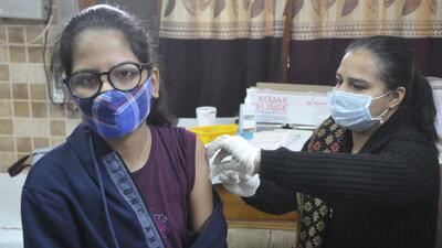 A girl getting vaccinated at a health centre in Sector 45, Chandigarh. (Keshav Singh/HT)