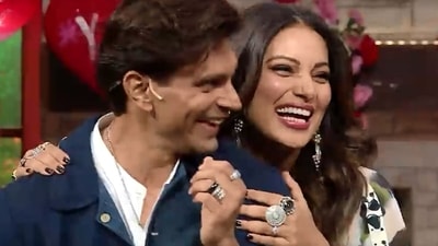 Karan Singh Grover and Bipasha Basu on The Kapil Sharma Show. Karan Singh Grover and Bipasha Basu on The Kapil Sharma Show.
