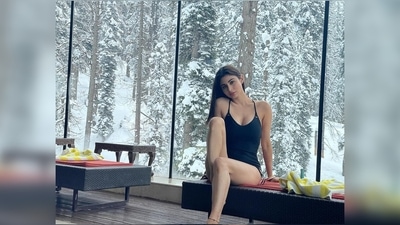 Mouni Roy raises the temperature indoors in a black swimsuit while the mercury falls below minus degrees outdoors. (Instagram/@imouniroy)
