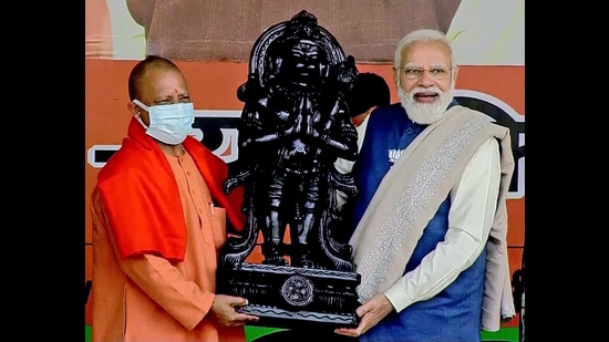 Prime Minister Narendra Modi being felicitated by UP Chief Minister Yogi Adityanath during a public meeting for the UP Polls, in Saharanpur on Thursday. (ANI)