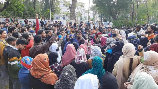 AMU students gather for a protest on the university campus in Aligarh over the Karnataka hijab controversy. (SOURCED IMAGE)