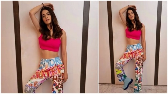 Radhika Madan, who made a successful breakthrough in Bollywood with her film Mard Ko Dard Nahi Hota, will soon be seen in Kuttey. She has impressed moviegoers with her acting skills and fans can't wait for her next. Radhika's fashion game is always on point and her Instagram handle says it all. In her recent Instagram stills, the actor can be seen acing the street style look in a pink crop top, printed pants and boots.(Instagram/@radhikamadan)