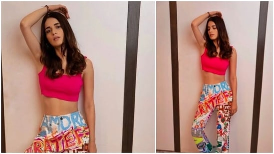 Radhika Madan recently took to her Instagram handle to share two pictures in a cropped tank top and white straight cut customised abstract printed pants.(Instagram/@radhikamadan)
