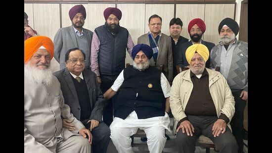 SAD president Sukhbir Singh Badal with industrialists at the residence of Gurmeet Singh Kular, president of FICO, in Ludhiana on Thursday. (HT Photo)