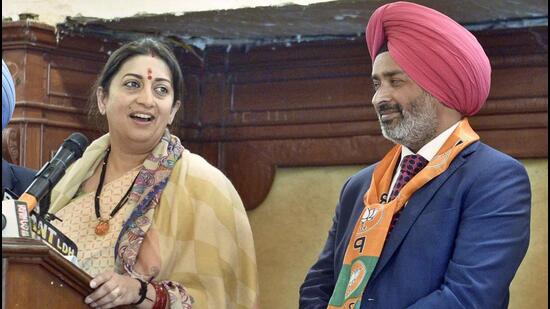 Union minister and BJP leader Smriti Irani campaigning for Bikram Sandhu, the party candidate from Ludhiana West constituency, on Wednesday. (Gurpreet Singh/HT)