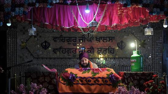 An Afghan Sikh priest prays at the Karte Parwan Gurdwara temple in Kabul, Afghanistan. (AFP)