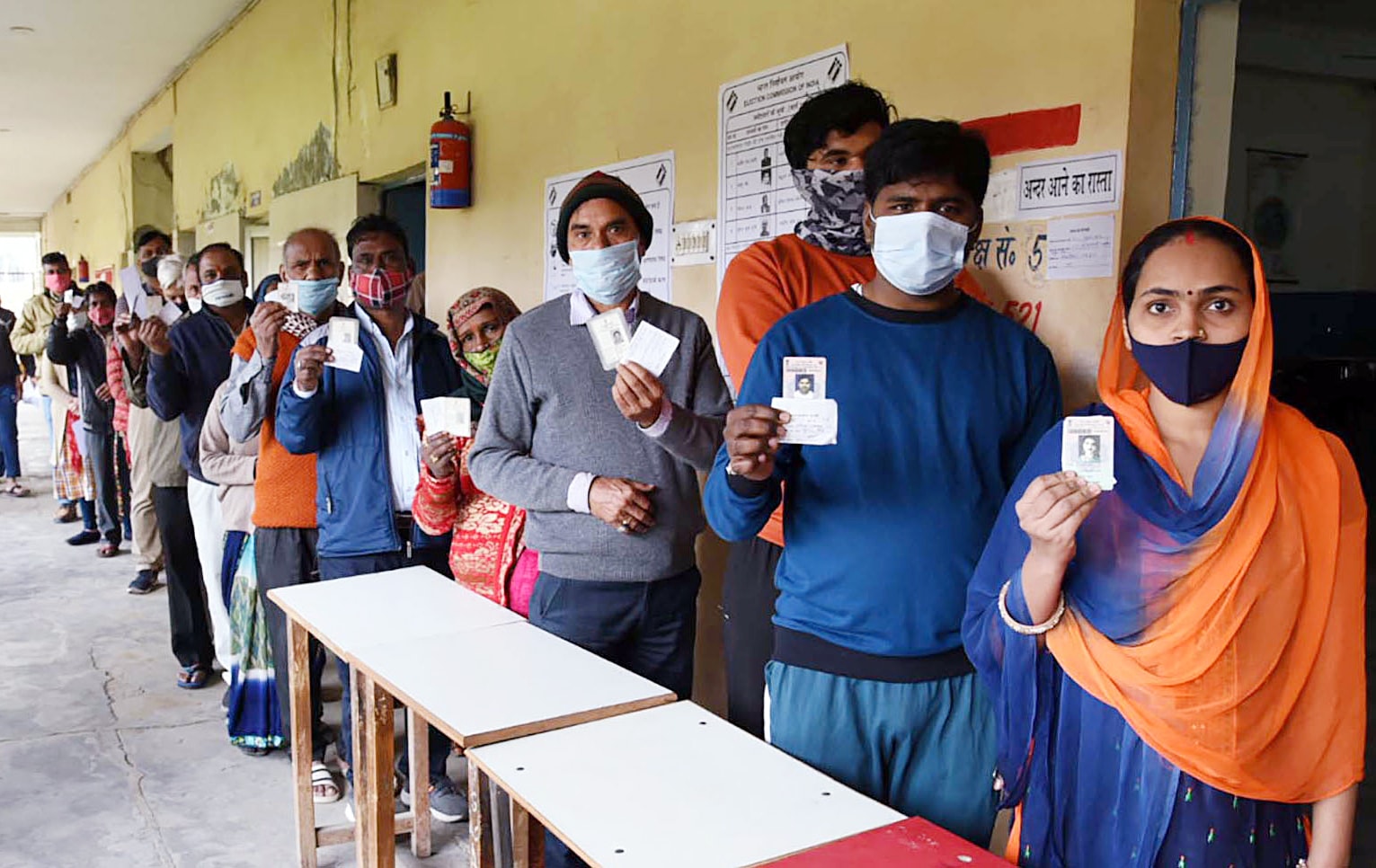 Voters standing in the queue to cast their votes at a polling booth, during the first phase of the UP Assembly Election, at Lal Kuan, Murad Nagar, in Ghaziabad on February 10, 2022. (ANI) Voters standing in the queue to cast their votes at a polling booth, during the first phase of the UP Assembly Election, at Lal Kuan, Murad Nagar, in Ghaziabad on February 10, 2022. (ANI)
