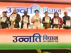 Congress general secretary Priyanka Gandhi Vadra releases party manifesto 'Unnati Vidhan Jan Ghoshna Patra' for the Uttar Pradesh Assembly elections.(PTI)