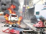 Vehicles seen set on fire next to a police chowki after demonstrations against the Citizenship Amendment Act (CAA) and National Register of Citizens (NRC) turned violent in Lucknow, Uttar Pradesh, India on December 19, 2019. (HT Photo) Vehicles seen set on fire next to a police chowki after demonstrations against the Citizenship Amendment Act (CAA) and National Register of Citizens (NRC) turned violent in Lucknow, Uttar Pradesh, India on December 19, 2019. (HT Photo)