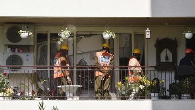 Teams of the Haryana State Disaster Response Force inspecting the first floor of Chintels Paradiso in Sector 109 in Gurugram on Friday. (Vipin Kumar /HT photo) Teams of the Haryana State Disaster Response Force inspecting the first floor of Chintels Paradiso in Sector 109 in Gurugram on Friday. (Vipin Kumar /HT photo)