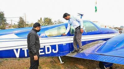 Jharkhand chief minister Hemant Soren takes a look at a VT-EDJ glider at an airport in Dumka. (PTI Photo)
