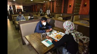 The 50% seating limit at eateries and cinemas continues in Delhi. (Sanchit Khanna/HT PHOTO) The 50% seating limit at eateries and cinemas continues in Delhi. (Sanchit Khanna/HT PHOTO)