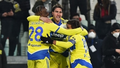 Juventus' Paulo Dybala celebrates scoring their first goal with Denis Zakaria and Dusan Vlahovic (REUTERS)
