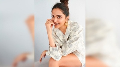 Deepika Padukone raised the glamour quotient as she posed in a grey and white checkered blazer and skirt set teamed with a basic white t-shirt. ( shaleenanathani) Deepika Padukone raised the glamour quotient as she posed in a grey and white checkered blazer and skirt set teamed with a basic white t-shirt. ( shaleenanathani)