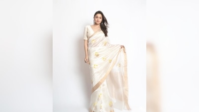 Alia Bhatt paired her saree with a white blouse with a plunging neckline. (Instagram/@aliaabhatt) Alia Bhatt paired her saree with a white blouse with a plunging neckline. (Instagram/@aliaabhatt)