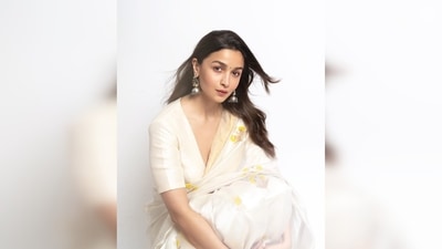 Alia Bhatt picked this gorgeous white saree that featured yellow and golden prints and a golden border from the clothing line Raw Mango. Ranbir Kapoor's mother Neetu Kapoor was mesmerised by Alia's beauty and commented "Beautiful." (Instagram/@aliaabhatt) Alia Bhatt picked this gorgeous white saree that featured yellow and golden prints and a golden border from the clothing line Raw Mango. Ranbir Kapoor's mother Neetu Kapoor was mesmerised by Alia's beauty and commented "Beautiful." (Instagram/@aliaabhatt)
