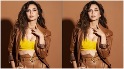 Styled by celebrity stylist Sukriti Grover, Kriti wore her tresses in wavy curls with a side part. (Instagram/@kriti.kharbanda)