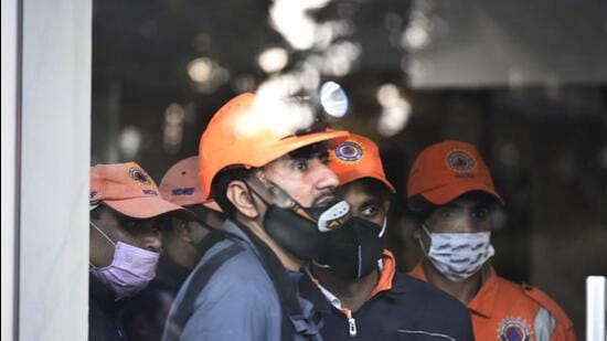 National Disaster Response Force (NDRF) team personnel on the first floor of Chintels Paradiso in Sector 109, Gurugram, India, on Friday, February 11, 2022. (Photo by Vipin Kumar/Hindustan Times) National Disaster Response Force (NDRF) team personnel on the first floor of Chintels Paradiso in Sector 109, Gurugram, India, on Friday, February 11, 2022. (Photo by Vipin Kumar/Hindustan Times)
