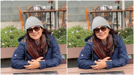Vidya smiled for the cameras in a denim jacket and a maroon scarf.(Instagram/@balanvidya)