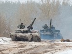 Ukrainian Military Forces servicemen of the 92nd mechanized brigade use tanks, self-propelled guns and other armored vehicles to conduct live-fire exercises near the town of Chuguev, in the Kharkiv region.(AFP)