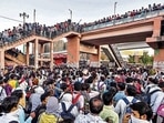 A huge rush of migrant workers at Anand Vihar Bus Terminal in New Delhi, days after the central government announced a nationwide lockdown to contain Covid-19, on March 28, 2020. (Biplov Bhuyan/HT PHOTO) A huge rush of migrant workers at Anand Vihar Bus Terminal in New Delhi, days after the central government announced a nationwide lockdown to contain Covid-19, on March 28, 2020. (Biplov Bhuyan/HT PHOTO)