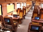 The interiors of the Mumbai-Ahmedabad Tejas Express. Tejas Express resumes services between Mumbai-Ahmedabad as Covid-19 cases decrease(HT Photo) The interiors of the Mumbai-Ahmedabad Tejas Express. Tejas Express resumes services between Mumbai-Ahmedabad as Covid-19 cases decrease(HT Photo)