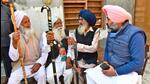 Congress candidate from Khanna constituency Gurkirat Kotli interacting with Turmari villagers on Saturday. Kotli thanked people for voting in huge numbers for his party in each Punjab assembly polls. (Gurpreet Singh/ HT) Congress candidate from Khanna constituency Gurkirat Kotli interacting with Turmari villagers on Saturday. Kotli thanked people for voting in huge numbers for his party in each Punjab assembly polls. (Gurpreet Singh/ HT)
