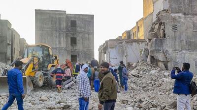 Rescue work in progress after a portion of a building collapsed in a JJ Colony, Bawana, in New Delhi on Friday. (PTI) Rescue work in progress after a portion of a building collapsed in a JJ Colony, Bawana, in New Delhi on Friday. (PTI)