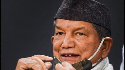 Congress leader Harish Rawat adjusts his face mask during the launch of a song for upcoming Uttarakhand polls, in New Delhi. (PTI Photo/Atul Yadav) Congress leader Harish Rawat adjusts his face mask during the launch of a song for upcoming Uttarakhand polls, in New Delhi. (PTI Photo/Atul Yadav)