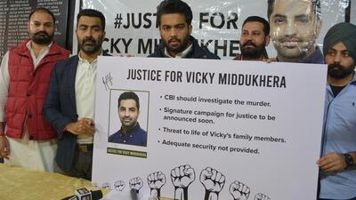 Ajay Pal Singh Middukhera (second from left), brother of murder victim, Vicky Middukhera, addressing the media at Chandigarh Press Club on Saturday. (Sant Arora/HT)