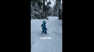 The image is taken from the Instagram video that shows the kid uttering motivating words to herself while snowboarding. (Instagram/@chasing.sage)