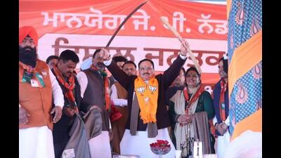 BJP president JP Nadda campaigning for party candidates Ashok Bath, Poonam Manik and Mohan Lal Banga at a rally in Balachaur constituency of Shaheed Bhagat Singh Nagar on Saturday in the run-up to the February 20 Punjab assembly elections. (HT Photo) BJP president JP Nadda campaigning for party candidates Ashok Bath, Poonam Manik and Mohan Lal Banga at a rally in Balachaur constituency of Shaheed Bhagat Singh Nagar on Saturday in the run-up to the February 20 Punjab assembly elections. (HT Photo)